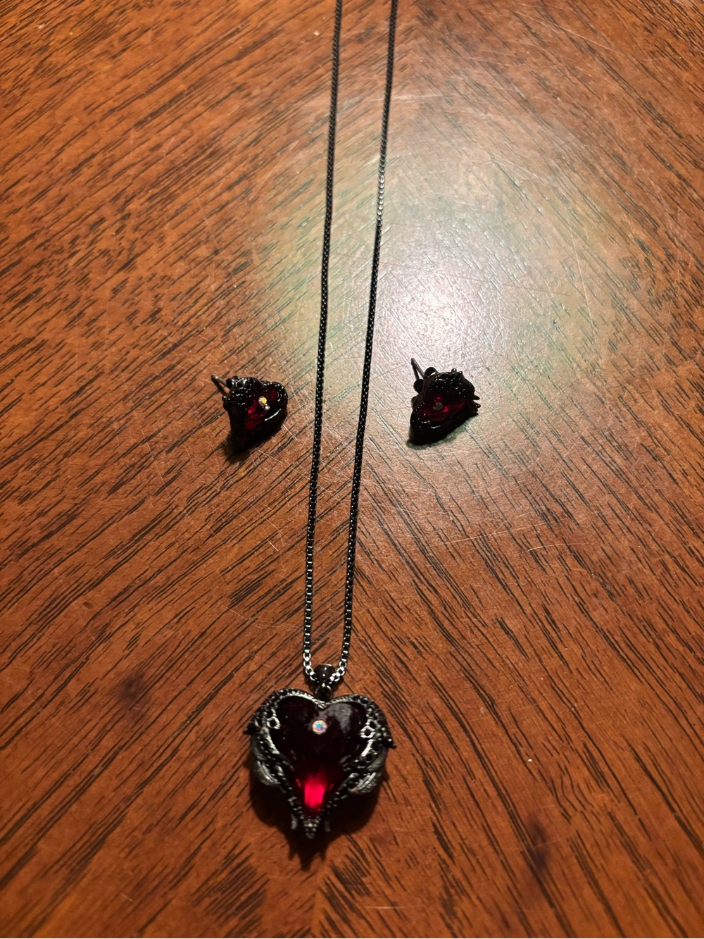 Dark Steel Heart Necklace and Earrings Set with Red Gemstone